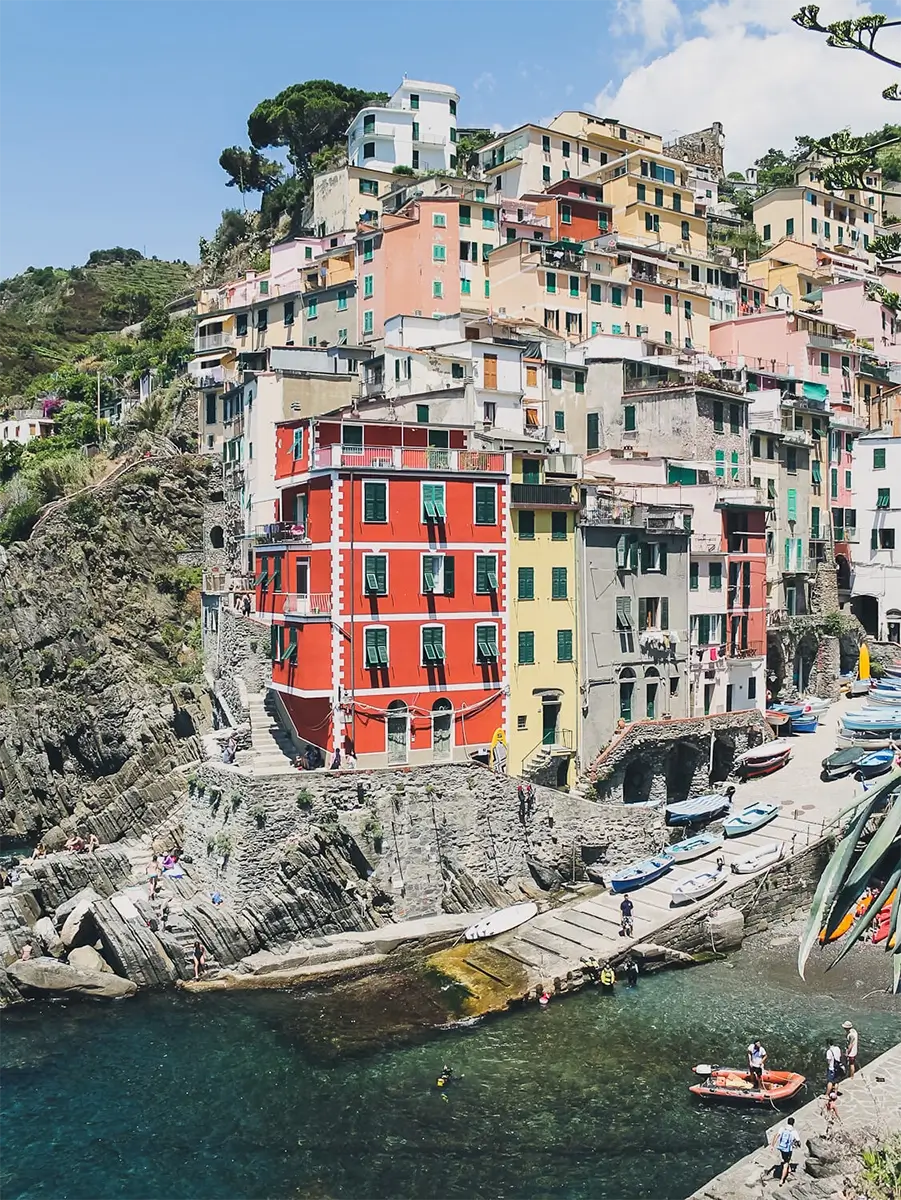 Cinque Terre: What to see in one day 1 Colorful fishing boats docked in the harbor of Riomaggiore, Cinque Terre.