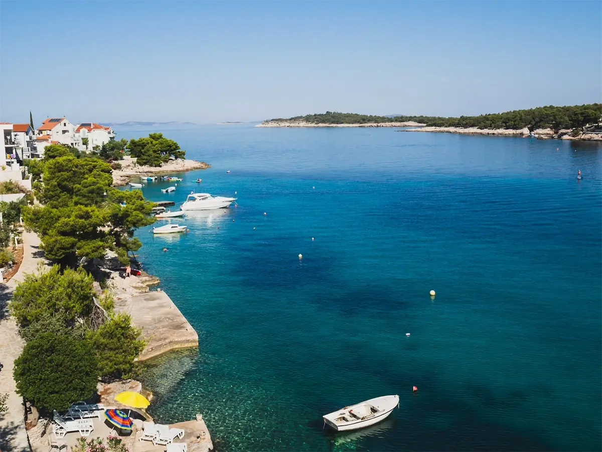 Exploring the beauty of Primošten: Great choice for Families 10 Scenic Bilo Beach with pebble shore and panoramic sea views near Primošten, Croatia