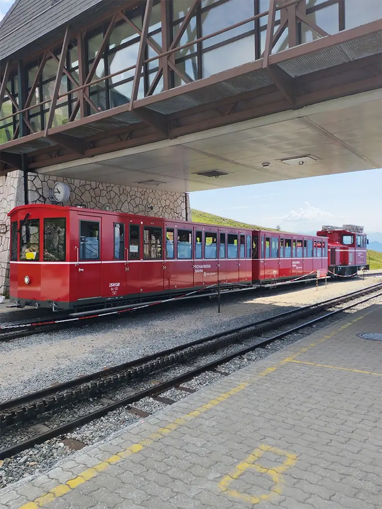 Vintage Schafberg cog railway mechanism and tracks climbing steep Alpine terrain